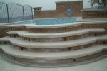 Scala piscina raggiata con lavorazioni a toro con incolaggio 3+3+2 in Botticino Spazzolato